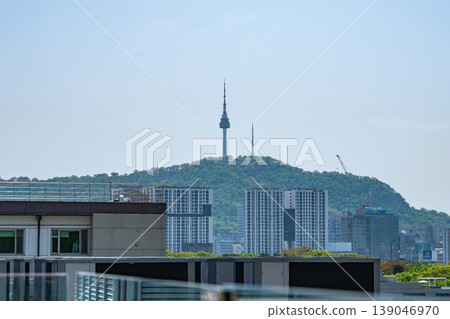 Seoul, South Korea - Apr. 18, 2026 : N Seoul Tower landmark on Namsan Mountain with city skyline, South Korea Seoul, South Korea - Apr. 18, 2026 : N Seoul Tower landmark on Namsan Mountain with city skyline, South Korea 139046970