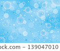 Soap bubbles floating against a light blue background; a sparkling, bubbly summer backdrop. 139047010