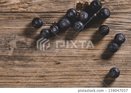 Top View of Blueberries on Wooden Background. Fresh Blueberries on Wooden Surface. 139047037