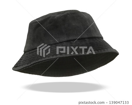 A dark black bucket hat floats stylishly against a white background. 139047133