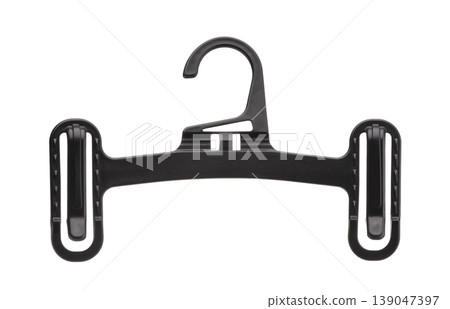 Front view of empty black plastic trouser hanger Front view of empty black plastic trouser hanger 139047397