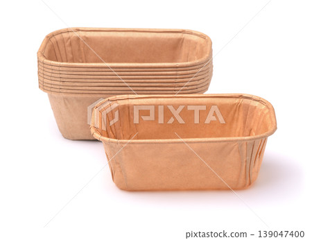 Empty disposable rectangular brown paper baking molds Empty disposable rectangular brown paper baking molds 139047400