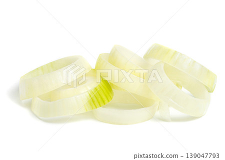 Heap of sliced onion rings on white 139047793