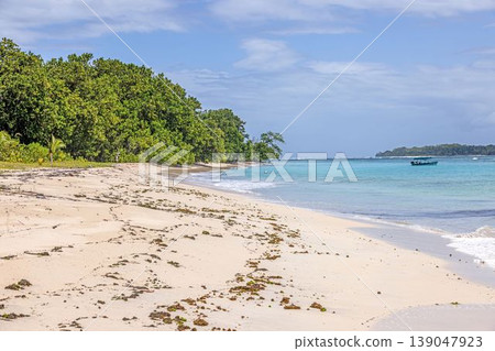Empty tropical beach with boat in Bocas del Toro Panama Empty tropical beach with boat in Bocas del Toro Panama 139047923