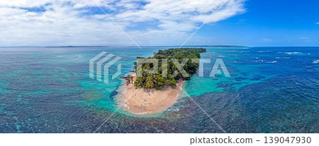 Small tropical island surrounded by turquoise water Panama aerial Small tropical island surrounded by turquoise water Panama aerial 139047930