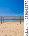 beach awaiting tourists and vacationers, empty frames for tents on a sandy beach, a Mediterranean vacation, vertical photo 139048370
