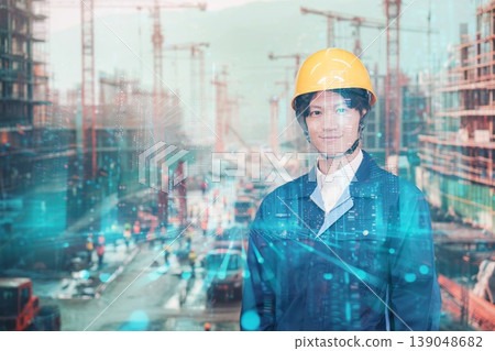 A young man working at a large construction site A young man working at a large construction site 139048682