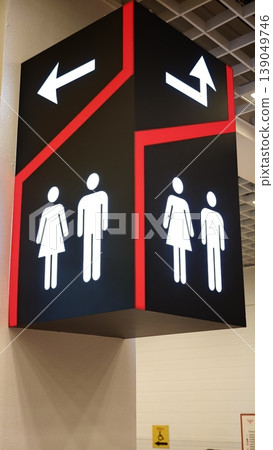 Sign showing restroom options for men, women, and family at a public place Sign showing restroom options for men, women, and family at a public place 139049746