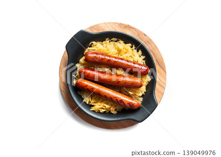 Stewed cabbage, sauerkraut and grilled sausages isolated Stewed cabbage, sauerkraut and grilled sausages isolated 139049976