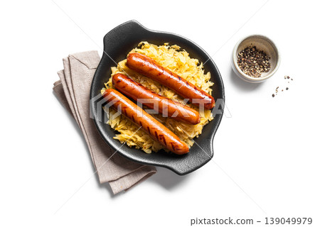 Braised cabbage, sauerkraut and grilled sausages isolated Braised cabbage, sauerkraut and grilled sausages isolated 139049979
