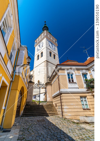 Tower of church of St. Wenceslas at Mikulov town, Czech Republic. Famous city near vineyards of Palava hills. Wine land, South Moravia region. 139050190