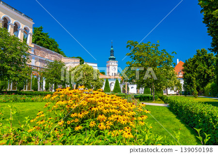 Tower of church of St. Wenceslas at Mikulov town, Czech Republic. Famous city near vineyards of Palava hills. Wine land, South Moravia region. Tower of church of St. Wenceslas at Mikulov town, Czech Republic. Famous city near vineyards of Palava hills. Wine land, South Moravia region. 139050198