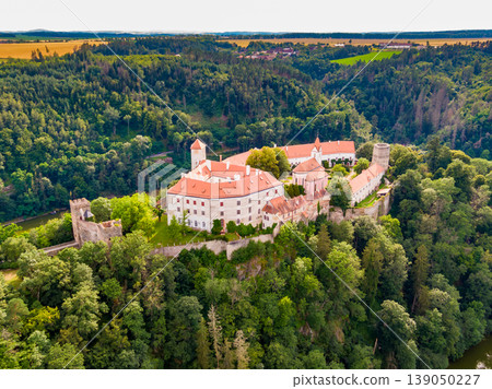 Aerial view of Bitov castle near Dyje river. Landscape panoramic view of medieval castle on top of hill with forest around. South Moravia region, Czech republic. Aerial view of Bitov castle near Dyje river. Landscape panoramic view of medieval castle on top of hill with forest around. South Moravia region, Czech republic. 139050227