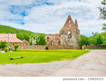 The Rosa Coeli monastery. Ancient catholic ruin of women monastery near Dolni Kounice city. Religion gothic place with spiritual history builded from stone. Medieval and historical heritage. The Rosa Coeli monastery. Ancient catholic ruin of women monastery near Dolni Kounice city. Religion gothic place with spiritual history builded from stone. Medieval and historical heritage. 139050333