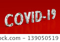3D text "COVID-19" covered by model of virus molecule of green and red color. Concept of warning text and infographic related to pandemic situation in Wuhan city, China. 3D render. 139050519