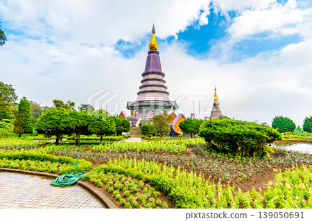 The royal stupa and pagoda dedicated to the king and queen of Thailand in Doi Inthanon national park near Chiang Mai city. "Phra Maha Dhatu Nabha Metaneedol" and "Nabhapol Bhumisiri" in local speak The royal stupa and pagoda dedicated to the king and queen of Thailand in Doi Inthanon national park near Chiang Mai city. "Phra Maha Dhatu Nabha Metaneedol" and "Nabhapol Bhumisiri" in local speak 139050691