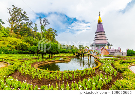 The royal stupa and pagoda dedicated to the king and queen of Thailand in Doi Inthanon national park near Chiang Mai city. "Phra Maha Dhatu Nabha Metaneedol" and "Nabhapol Bhumisiri" in local speak The royal stupa and pagoda dedicated to the king and queen of Thailand in Doi Inthanon national park near Chiang Mai city. "Phra Maha Dhatu Nabha Metaneedol" and "Nabhapol Bhumisiri" in local speak 139050695