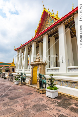 Wat Pho temple in Bangkok city, Thailand. Ancient buddhism temple, view of building with lying Buddha statue inside. Famous tourist destination. Religion building. 139050794