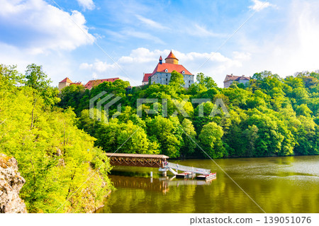 Veveri castle, Czech republic. Old ancient castle near the Brno city in South Moravia region. Translation: "Hrad Veveri" means "Castle Veveri". Veveri castle, Czech republic. Old ancient castle near the Brno city in South Moravia region. Translation: "Hrad Veveri" means "Castle Veveri". 139051076