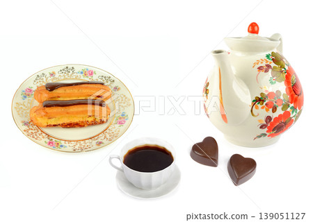 Sweet Dessert Composition with Eclairs and Heart Shaped Candy Sweet Dessert Composition with Eclairs and Heart Shaped Candy 139051127