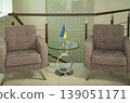 Modern armchairs and table with Ukrainian flag in office. 139051171