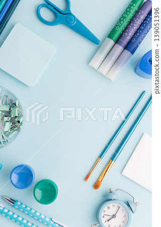 Blue and Green School Supplies Flat Lay Blue and Green School Supplies Flat Lay 139051396