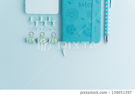 Blue School Stationery Flat Lay on Blue Background Blue School Stationery Flat Lay on Blue Background 139051397