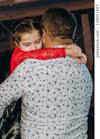 Hug daughter father embrace affection family Hug daughter father embrace affection family 139051487