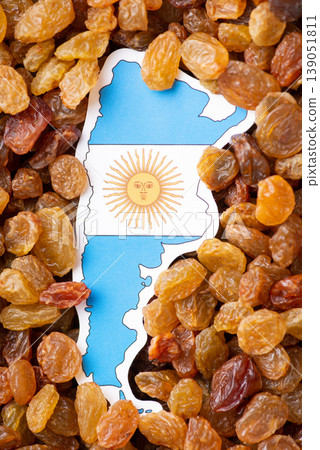 Flag and map of Argentina in raisins. Agribusiness in Argentina, leader of raisins produced Flag and map of Argentina in raisins. Agribusiness in Argentina, leader of raisins produced 139051811