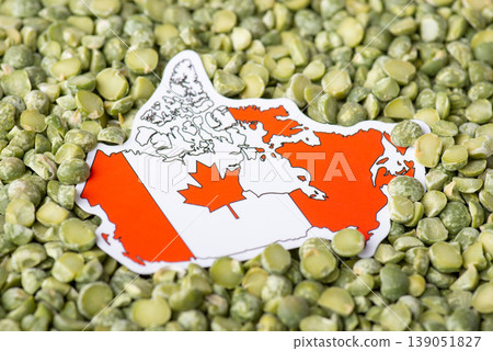 Flag and map of Canada in green pea. Origin of pea grain, agribusiness in Canada Flag and map of Canada in green pea. Origin of pea grain, agribusiness in Canada 139051827