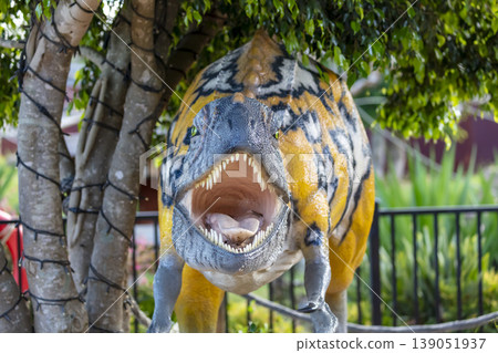 A large model Dinosaur in the outdoors at a wildlife park in Australia A large model Dinosaur in the outdoors at a wildlife park in Australia 139051937