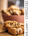 Crunchy Almond Biscotti cantuccini Stacked on Rustic Wooden Board Close-Up, Italian Twice-Baked Cookies 139052182