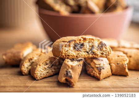 Crunchy Almond Biscotti cantuccini Stacked on Rustic Wooden Board Close-Up, Italian Twice-Baked Cookies Crunchy Almond Biscotti cantuccini Stacked on Rustic Wooden Board Close-Up, Italian Twice-Baked Cookies 139052183