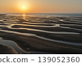 Low tide patterns on the coast 139052360