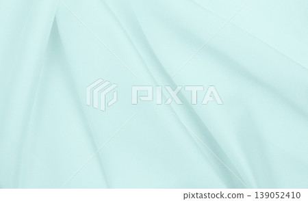 Smooth elegant blue silk or satin luxury cloth texture as abstract background. Luxurious background design 139052410