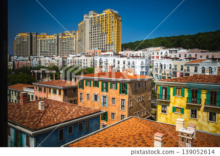 A streetscape lined with colorful Mediterranean-style buildings on Phu Quoc Island, Vietnam. A streetscape lined with colorful Mediterranean-style buildings on Phu Quoc Island, Vietnam. 139052614