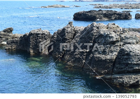 The rocky landscape of the Shonai coast where rocky shores of strangely shaped rocks continue The rocky landscape of the Shonai coast where rocky shores of strangely shaped rocks continue 139052793