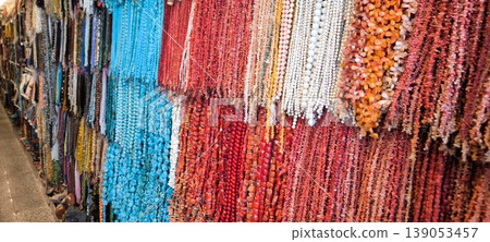 A bright variety of beads and jewelry made from natural stones A bright variety of beads and jewelry made from natural stones 139053457