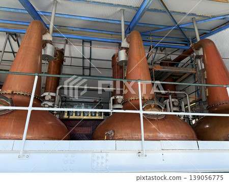 A traditional distillery on Islay, Scotland, famous for its peaty whisky. A traditional distillery on Islay, Scotland, famous for its peaty whisky. 139056775