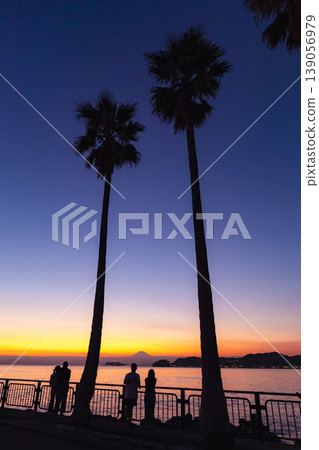 Zushi Kotsubo: The evening view during the magic hour after sunset, with Enoshima Island and Mount Fuji in the background. 139056979