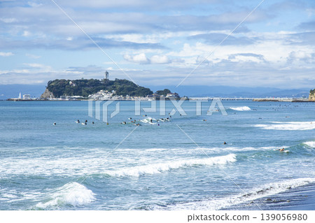 Shonan Shichirigahama: A view of Enoshima and surfers. 139056980