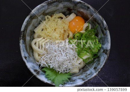 Ise udon topped with whitebait and egg. Ise udon topped with whitebait and egg. 139057899
