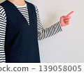A woman with fingers pointing 139058005