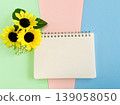 Sunflowers and a blank notepad 139058050
