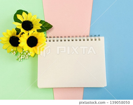 Sunflowers and a blank notepad 139058050