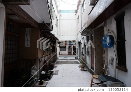 A quiet alleyway bar district before opening hours. 139058114