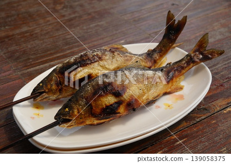 Salt-grilled sweetfish Salt-grilled sweetfish 139058375