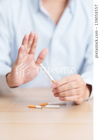 hand refuse to cigarette for World No Tobacco Day concept, quitting smoking to prevent Lung Cancer, COPD, Emphysema and Tuberculosis disease. healthy lifestyle resolution, stop nicotine addiction hand refuse to cigarette for World No Tobacco Day concept, quitting smoking to prevent Lung Cancer, COPD, Emphysema and Tuberculosis disease. healthy lifestyle resolution, stop nicotine addiction 139058557