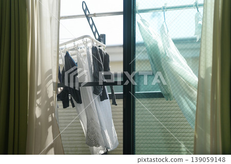 Laundry drying on the balcony | A refreshing image of everyday life 139059148