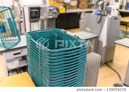 Stacked shopping baskets 139059239